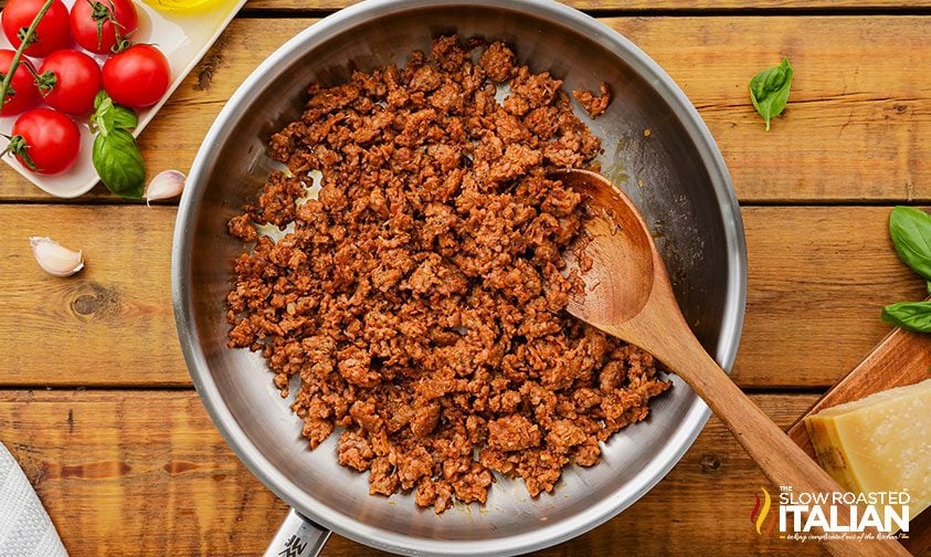 browning spicy Italian sausage in skillet