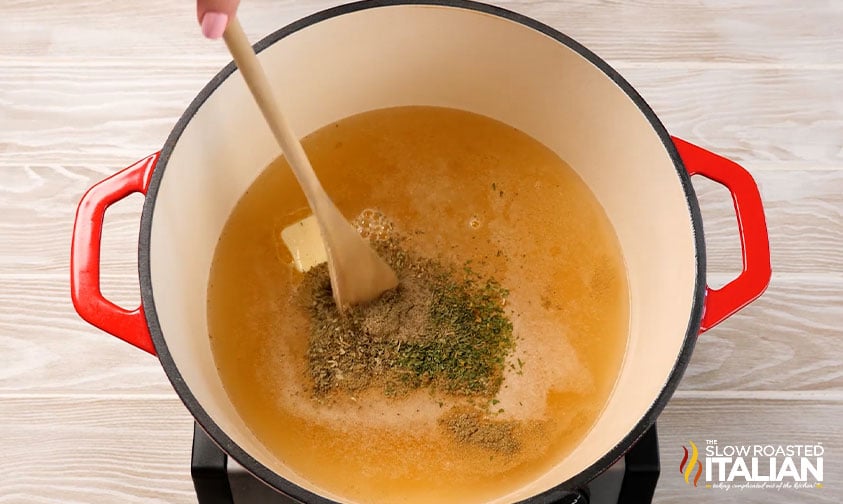 chicken broth and seasonings in a large pot