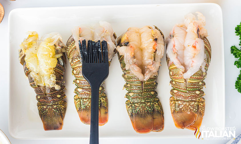 brushing lobster tails with butter mixture