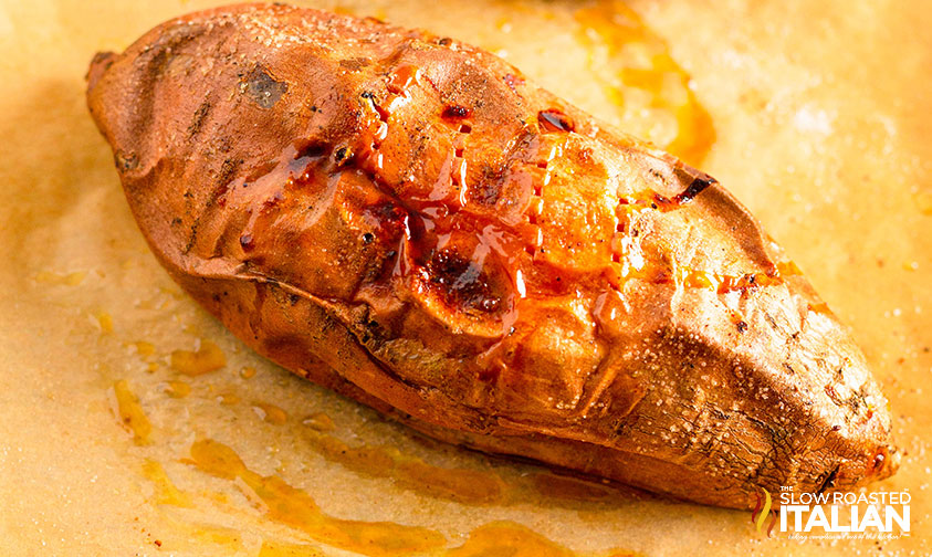 baked sweet potato on parchment paper