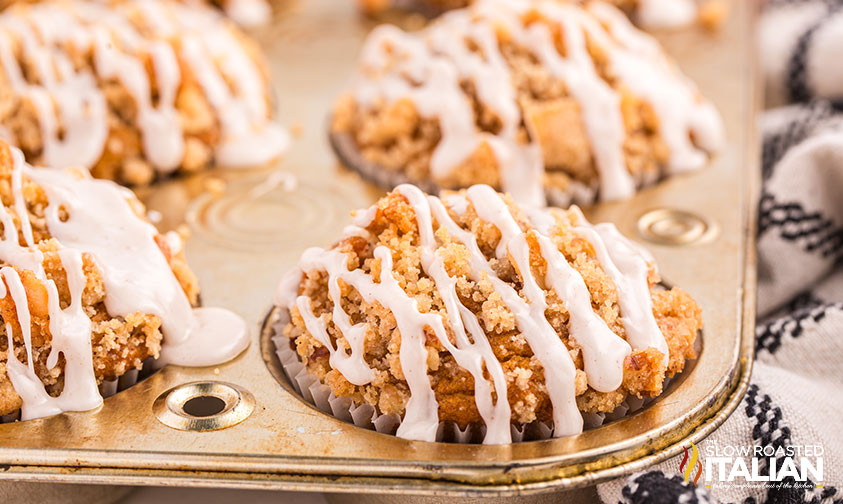 pumpkin streusel muffins with a drizzle of glaze