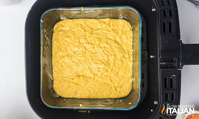 air fryer cornbread batter in air fryer basket