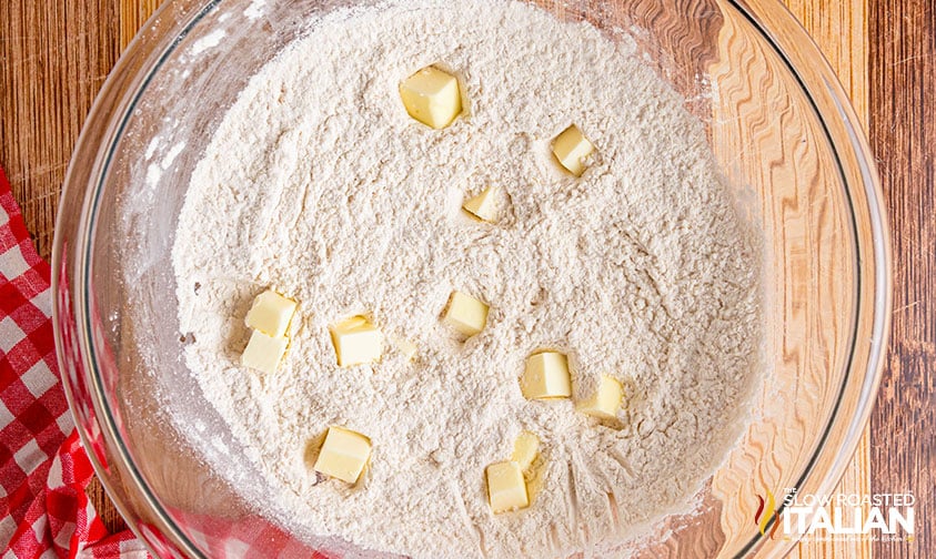 flour and cold butter added to mixing bowl