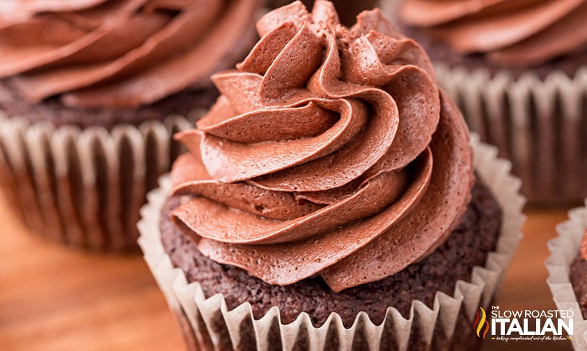 closeup of a keto chocolate cupcake with piped frosting