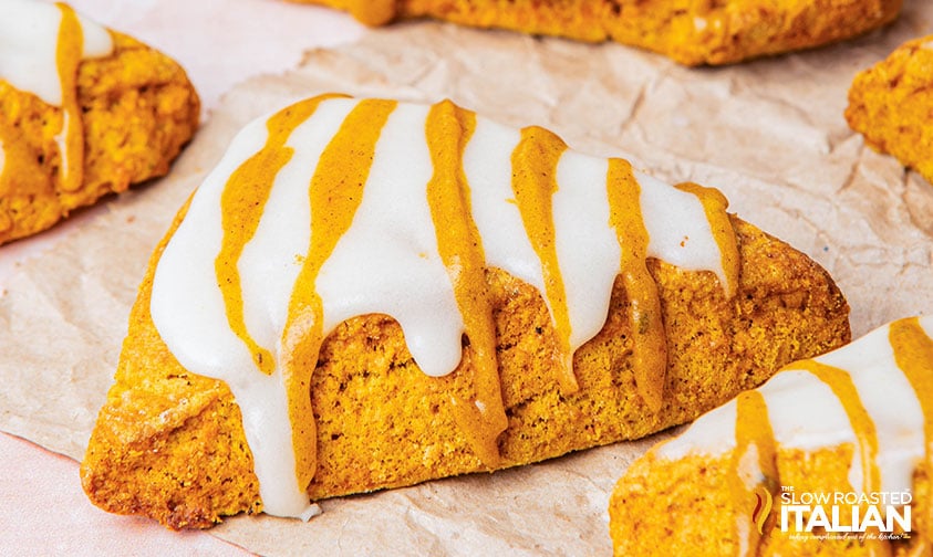 pumpkin scones drizzled with pumpkin glaze