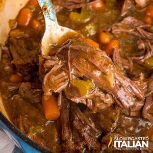 copycat cracker barrel pot roast on a spoon