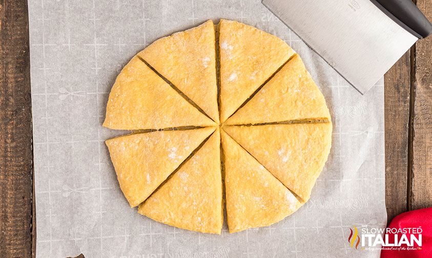 slicing zeppoli donut dough