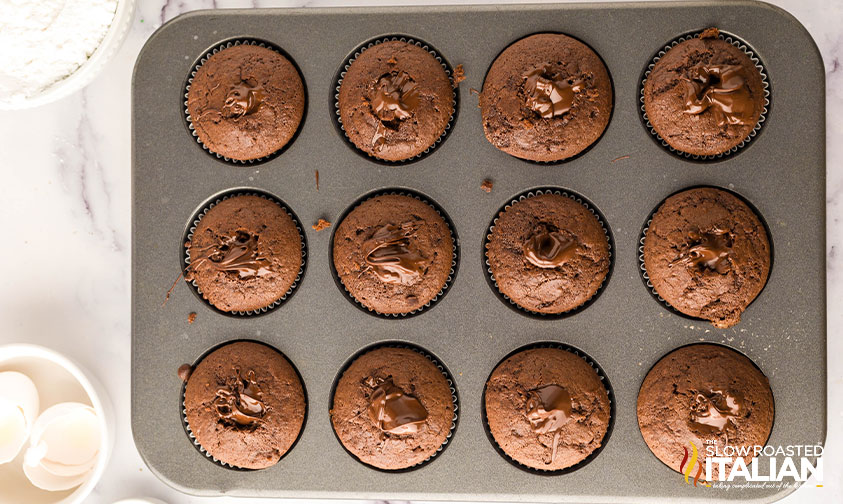 baked death by chocolate cupcakes in a muffin pan