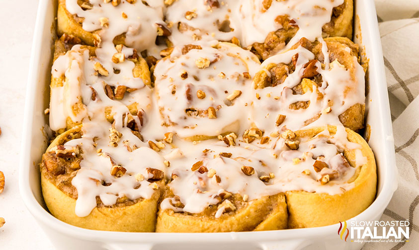 baked maple cinnamon rolls in baking dish