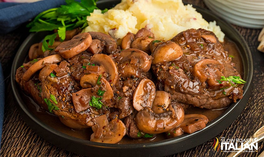 steak diane cheesecake factory on a plate with mashed potatoes