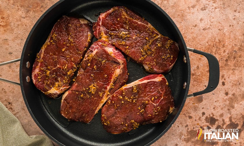 frying easy teriyaki steaks in skillet