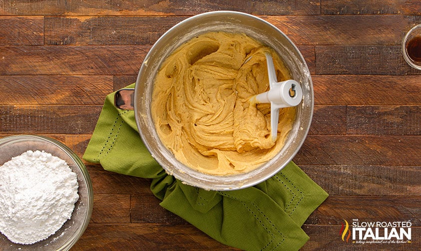 mixed wet ingredients in mixing bowl for eggnog cookies