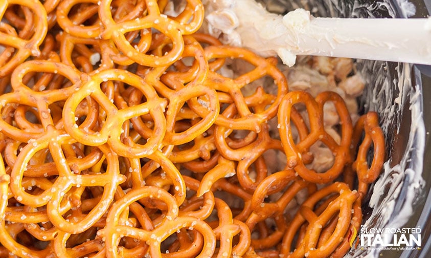 adding mini pretzel twists to slow cooker