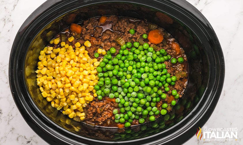 peas and corn added to slow cooker