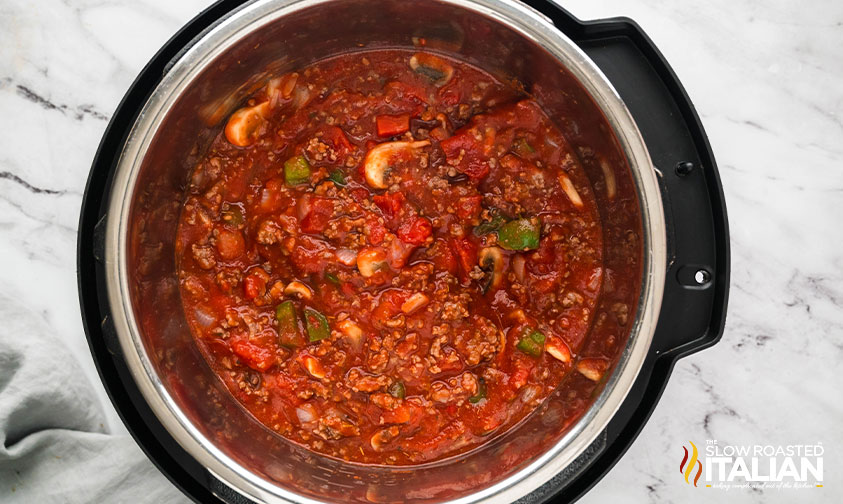 tomato sauce, diced tomatoes and tomato paste added to beef mixture in instant pot