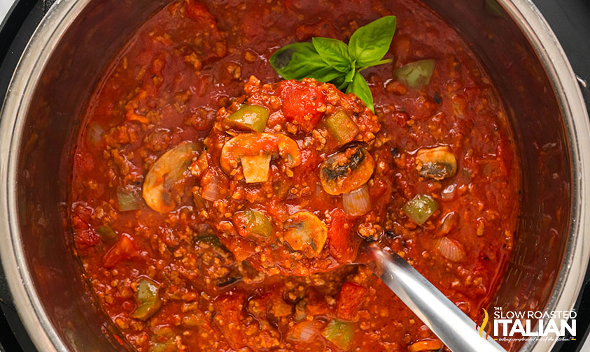 ladle of spaghetti meat sauce in instant pot