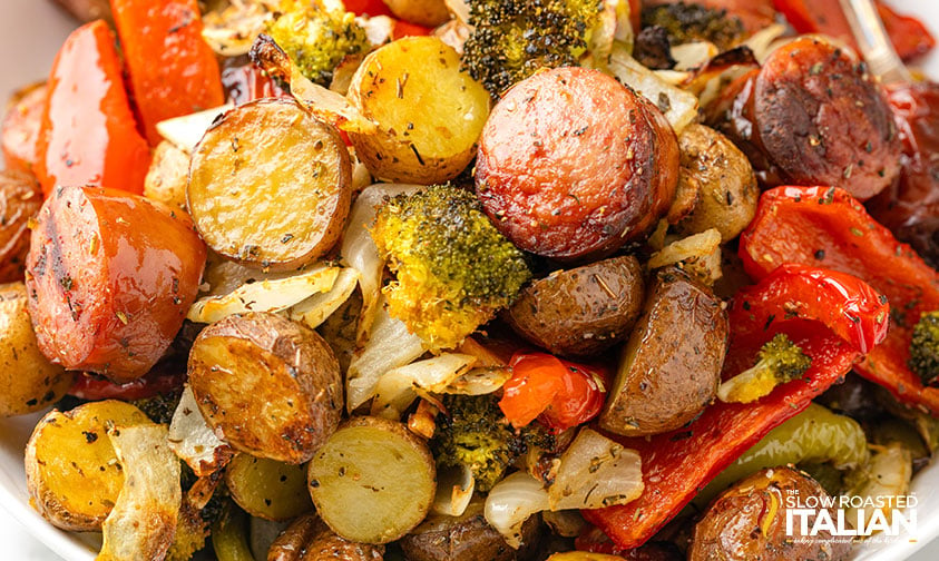 closeup of air fryer sausage and potatoes