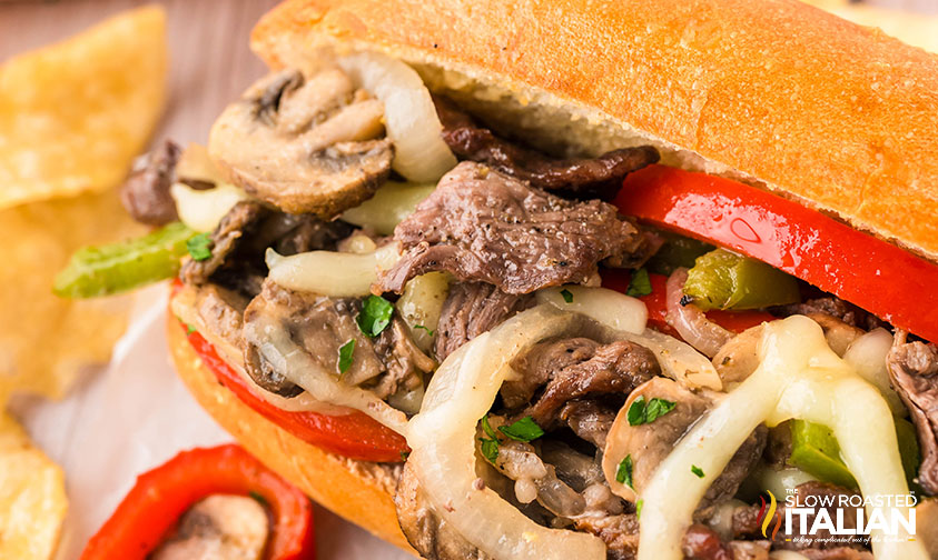 sheet pan philly cheesesteak recipe on a hoagie roll