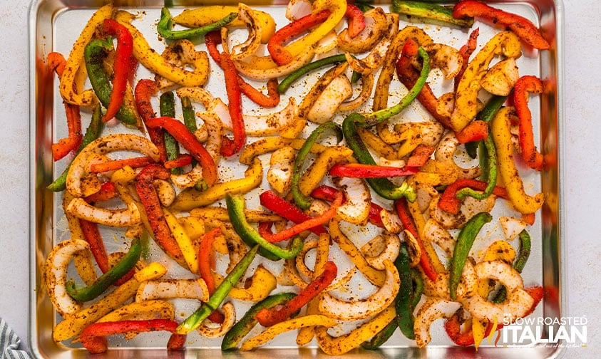 baked peppers and onions on a baking sheet