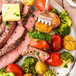 closeup of steak sheet pan steak and potatoes