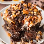 closeup of chocolate caramel poke cake