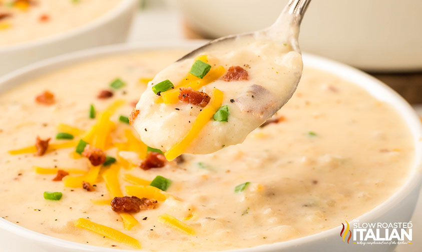 closeup of baked potato soup on a spoon