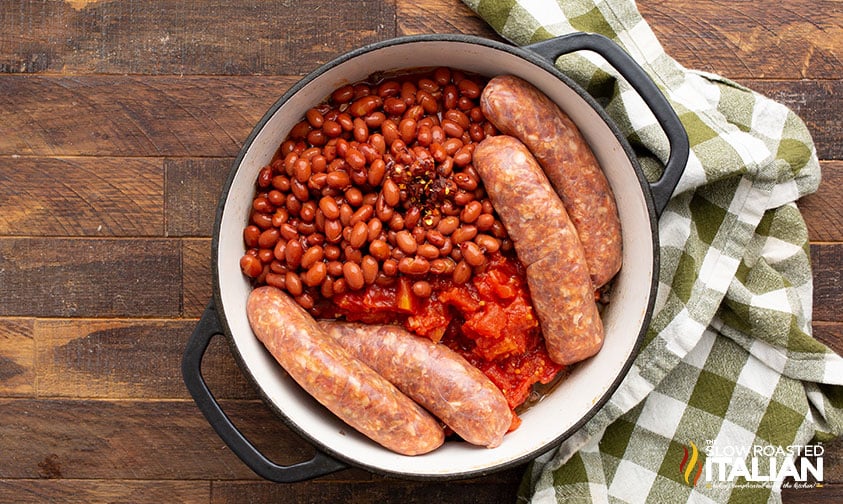 sausage, tomatoes and beans added to large pot