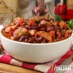 closeup of Italian sausage chili in a white bowl