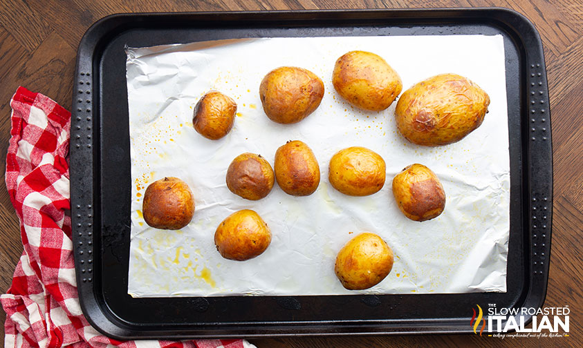 baked potatoes on a baking sheet