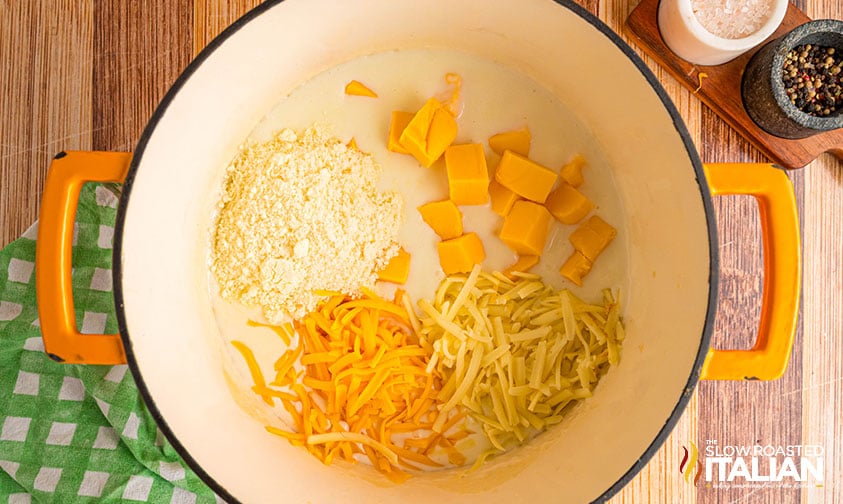 adding 4 cheese to large pot