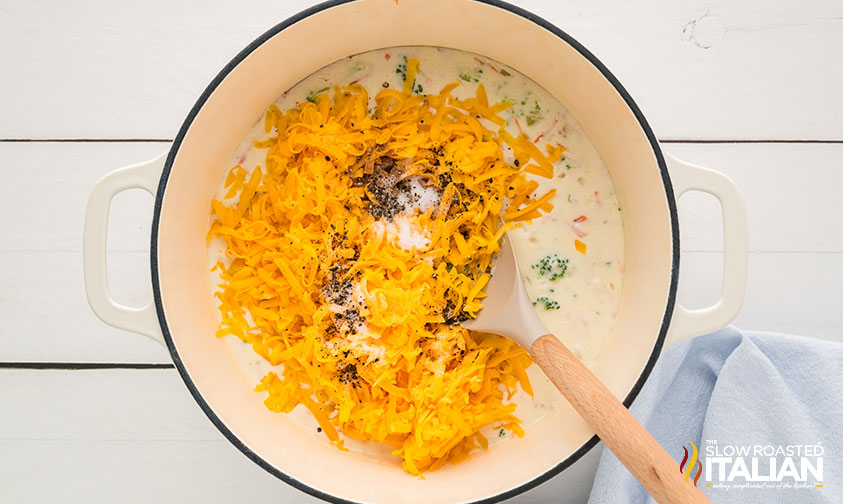 mixing cheese and seasoning into panera broccoli cheddar soup