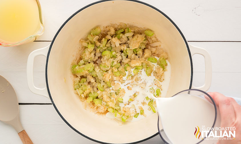 Copycat Panera Broccoli Cheddar Soup Recipe ingredients added to a large pot