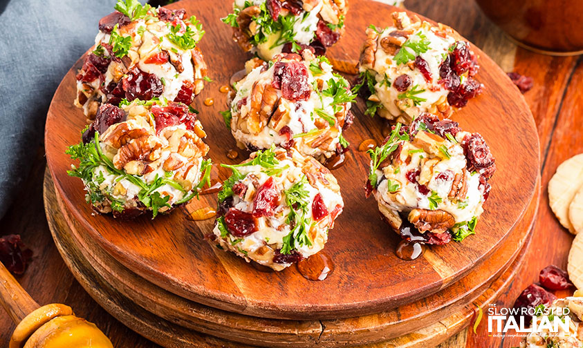 cranberry goat cheese balls on a serving tray