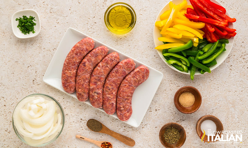 ingredients for sheet pan sausage peppers and onions