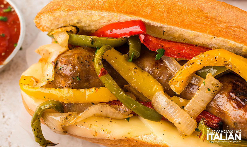 closeup of sheet pan sausage and peppers