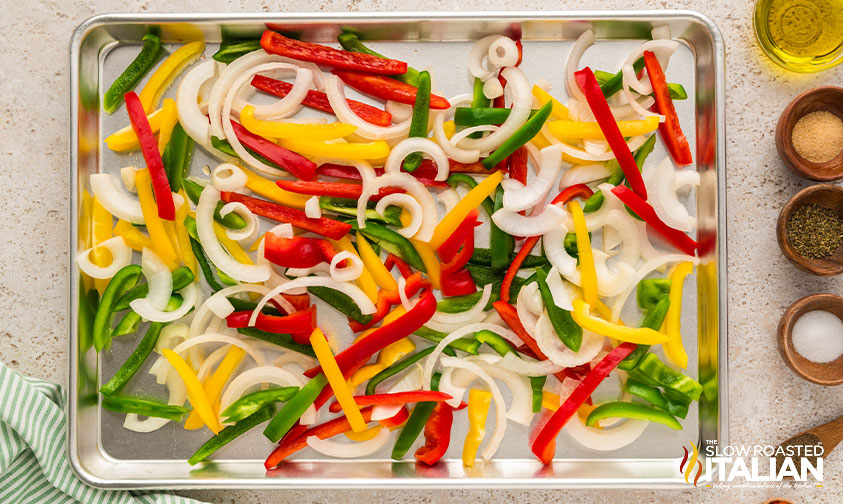 peppers and onions on a sheet pan