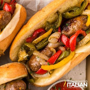 closeup of sheet pan sausage and peppers