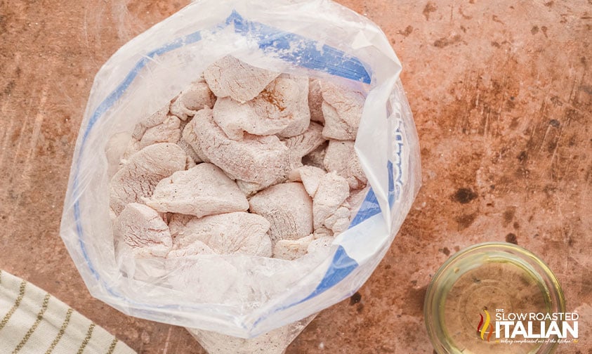 chicken pieces in large storage bag