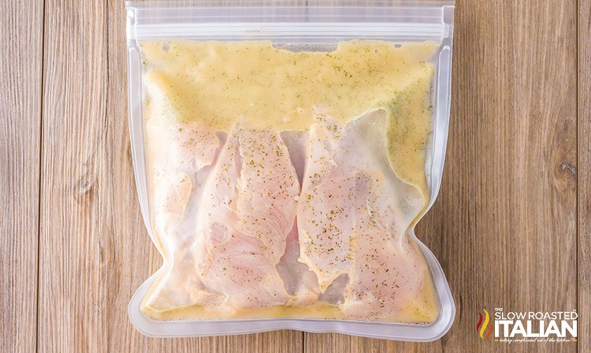 chicken breasts marinating in resealable plastic bag