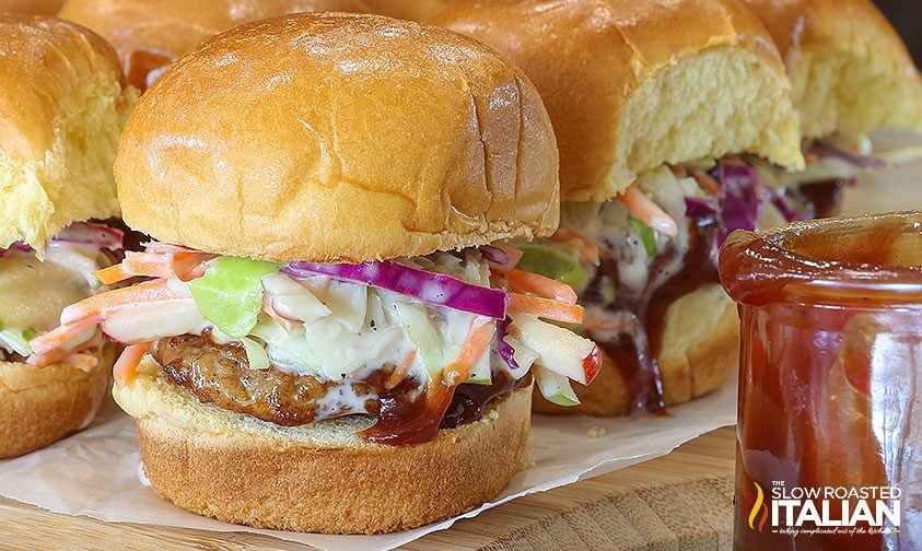 close up: bbq pork slider with apple slaw on a brioche bun